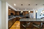 Gourmet Kitchen with High end Appliances, Long Seating Island 